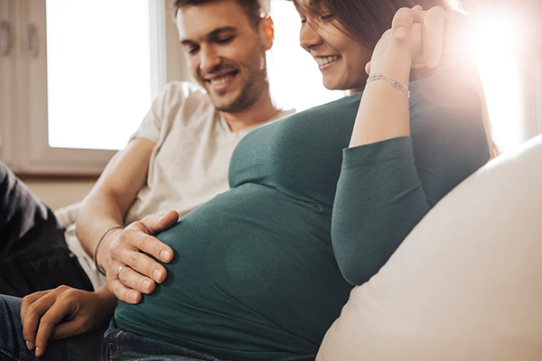 Expecting mother with partner.