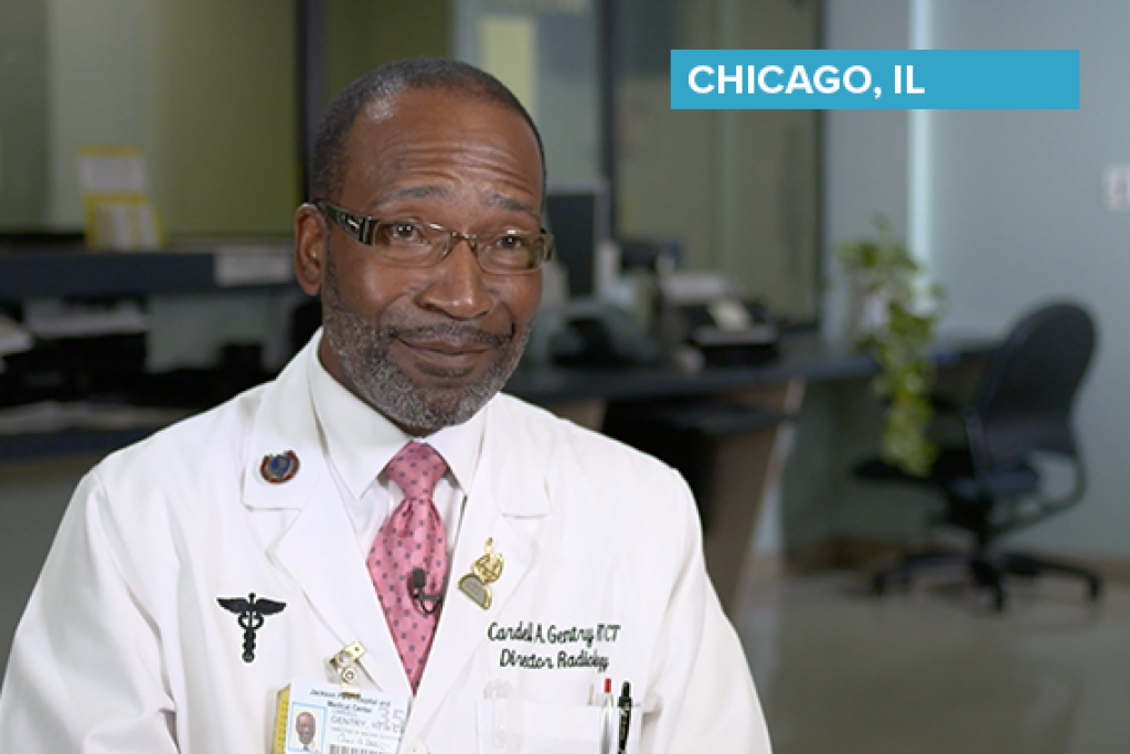 Male provider speaking in an office setting.